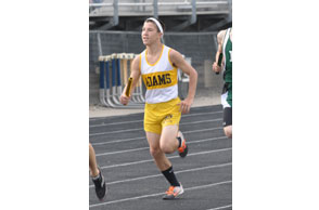GUTTING IT OUT: Despite being only 5-foot-6, Rochester Adams senior distance ace Stephen Biebelhausen yearns to be among leaders in 3,200 meters at Division 1 state meet. File Photo | Dan Stickradt
