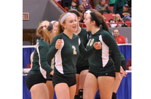 MAD DASH: Members of Pontiac Notre Dame Prep's volleyball team joins at mid-court following the Fighting Irish's 3-1 victory over Grand Rapids South Christian in the Class B title game at Battle Creek's Kellogg Arena.
